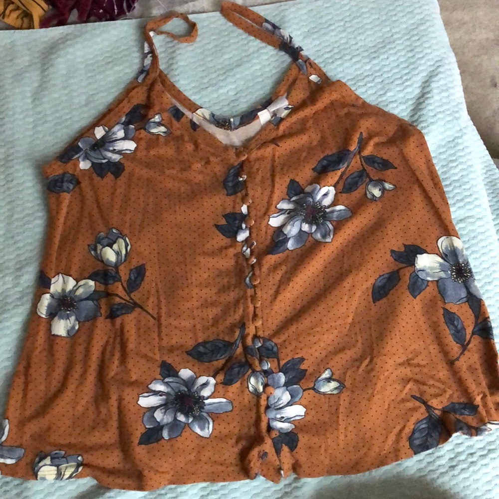 Flowy flower button up tank.